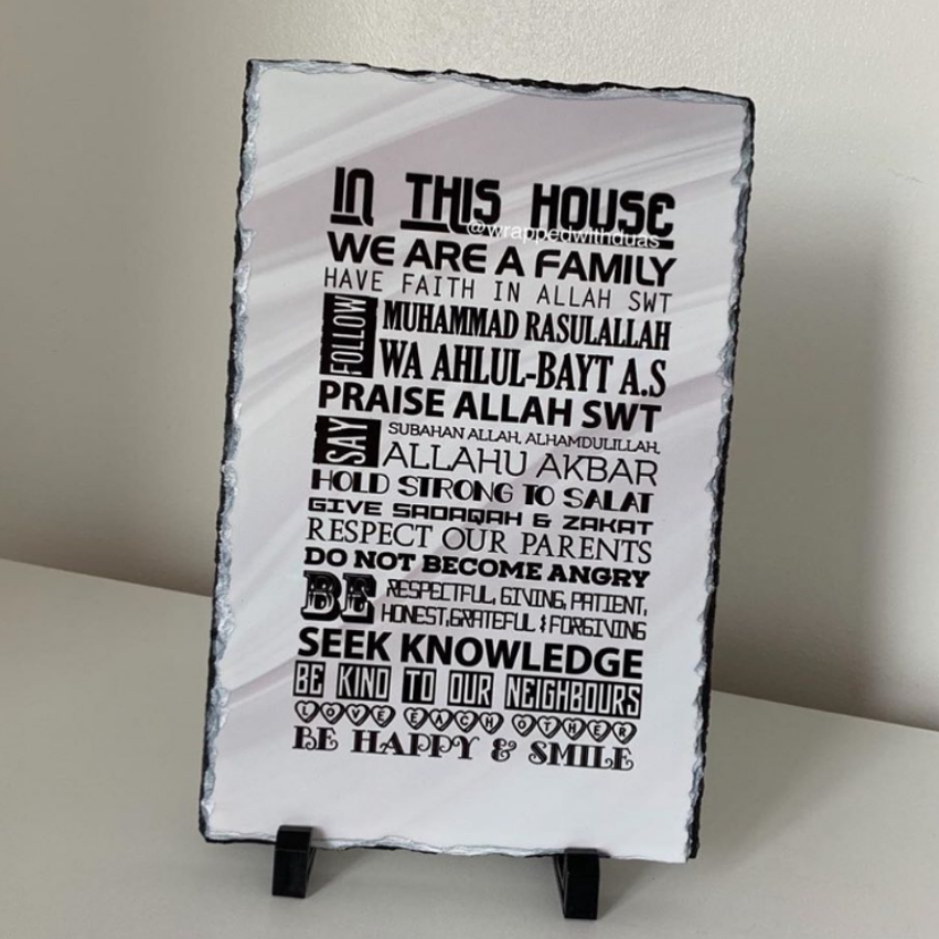 In This House Islamic family rules rock slate with bold typography on white background with mini stands