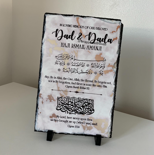 Personalised Islamic memorial rock slate with Surah Ikhlas in Arabic calligraphy and Quran 17:24 dua on warm marble background