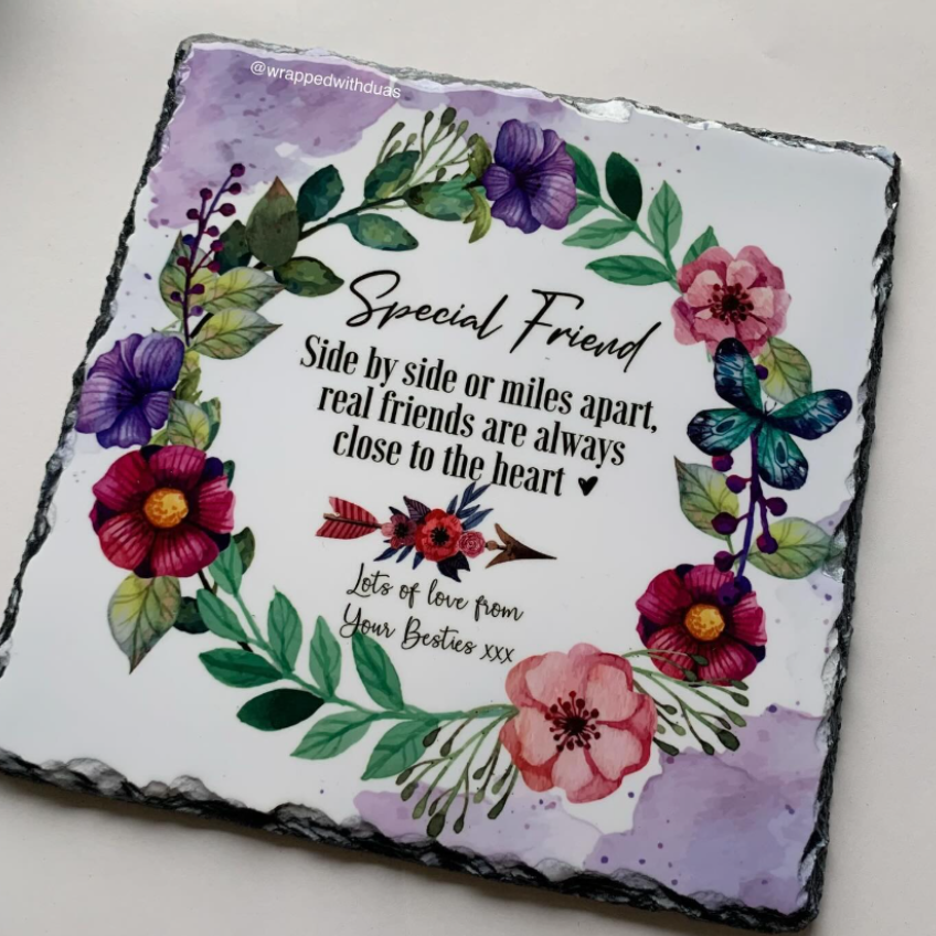 A square slate with a custom floral design, featuring the text 'Special Friend' surrounded by watercolor flowers, green leaves, and butterflies on a white background.